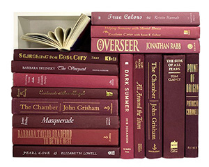 Assorted burgundy books